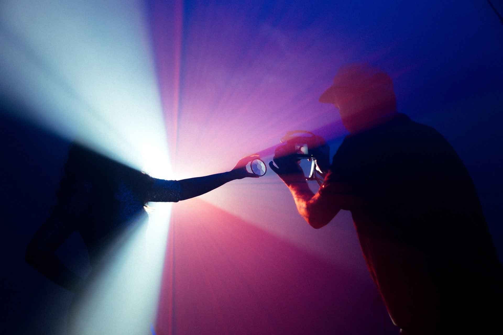 Web Developer Taking a Picture of Light